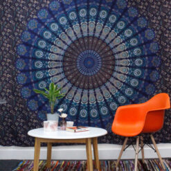 Classic Mandala double bedspread and wall hanging displayed as wall art behind table and chair
