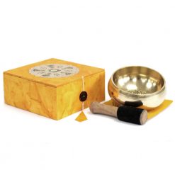 Solid brass special meditation gift set showing polished brass bowl on cushion next to striker and gift box
