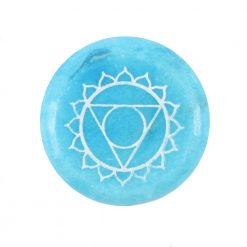 Throat chakra round blue meditation stone close up