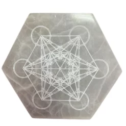 Hexagonal 18cm selenite charging plate showing hand carved direction and decision pattern